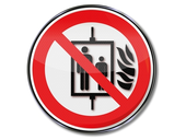 Zákaz používání výtahu za požáru - výtah neslouží k evakuaci osob